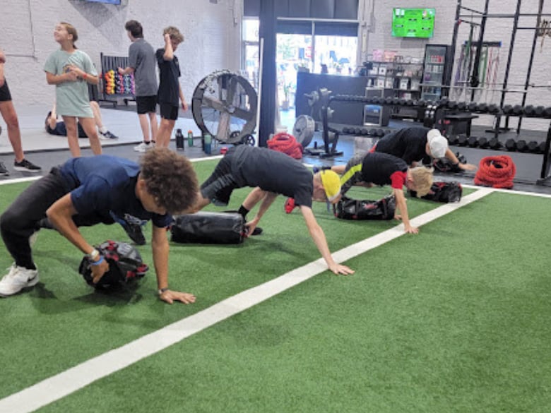Kids and teens participating in structured youth fitness programs at Wild Tribe Academy in Lebanon, TN